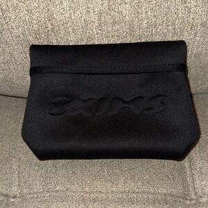 SKIMS mini neoprene pouch